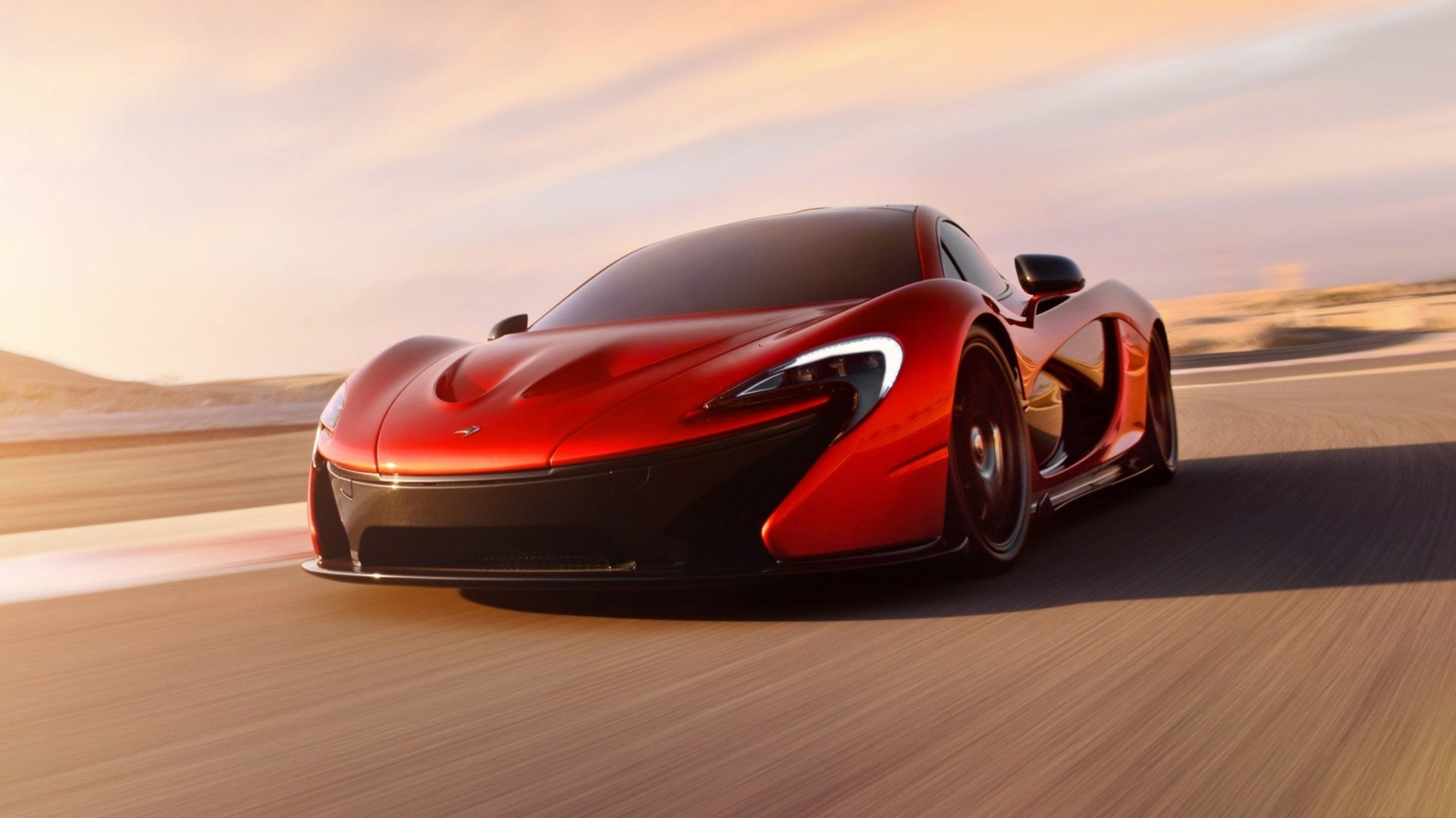 Wallpaper #hXOWg44BFI5NbQks1Buy19 A Red Mclaren P1 Driving on an Asphalt Road