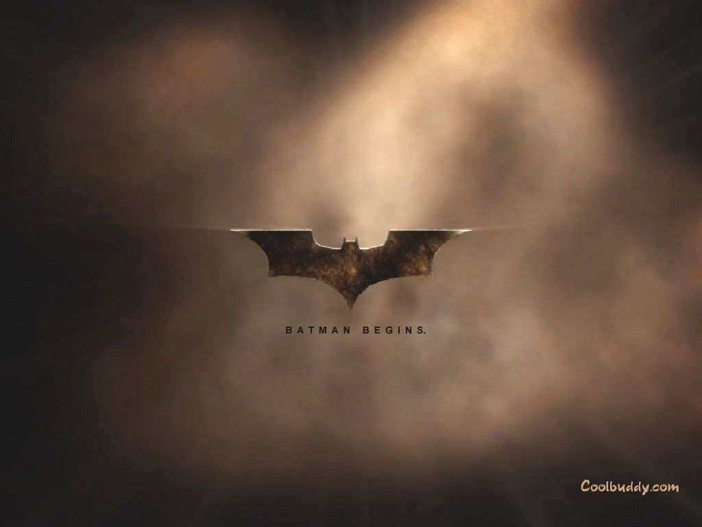 Wallpaper #-0V6jo4B7YBJg1BVf5yq14 Batman Begins Logo in a Dark Background
