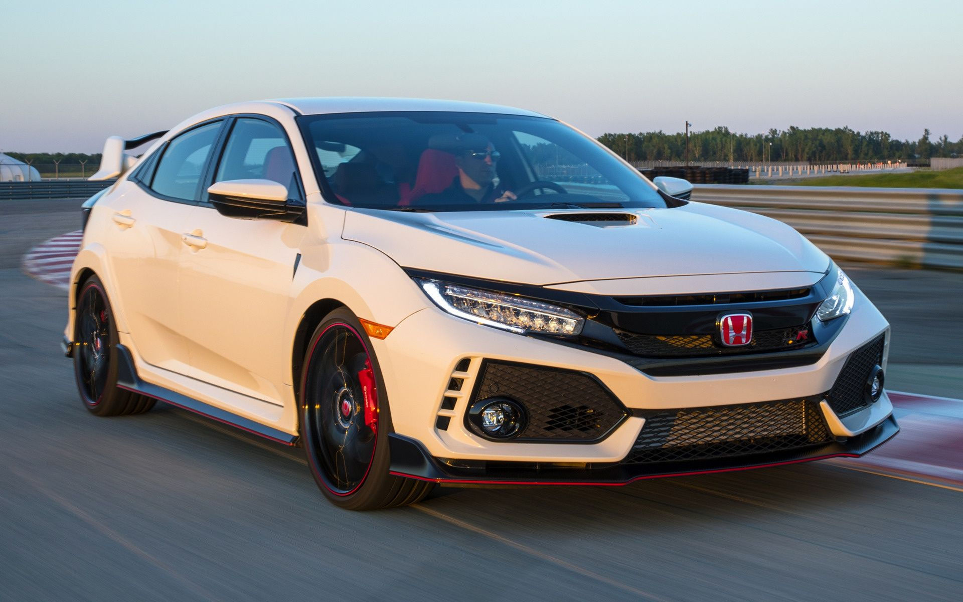 Wallpaper #r0U0l44B7YBJg1BVZKDq5 A White Honda Civic Type R Race Car on a Track