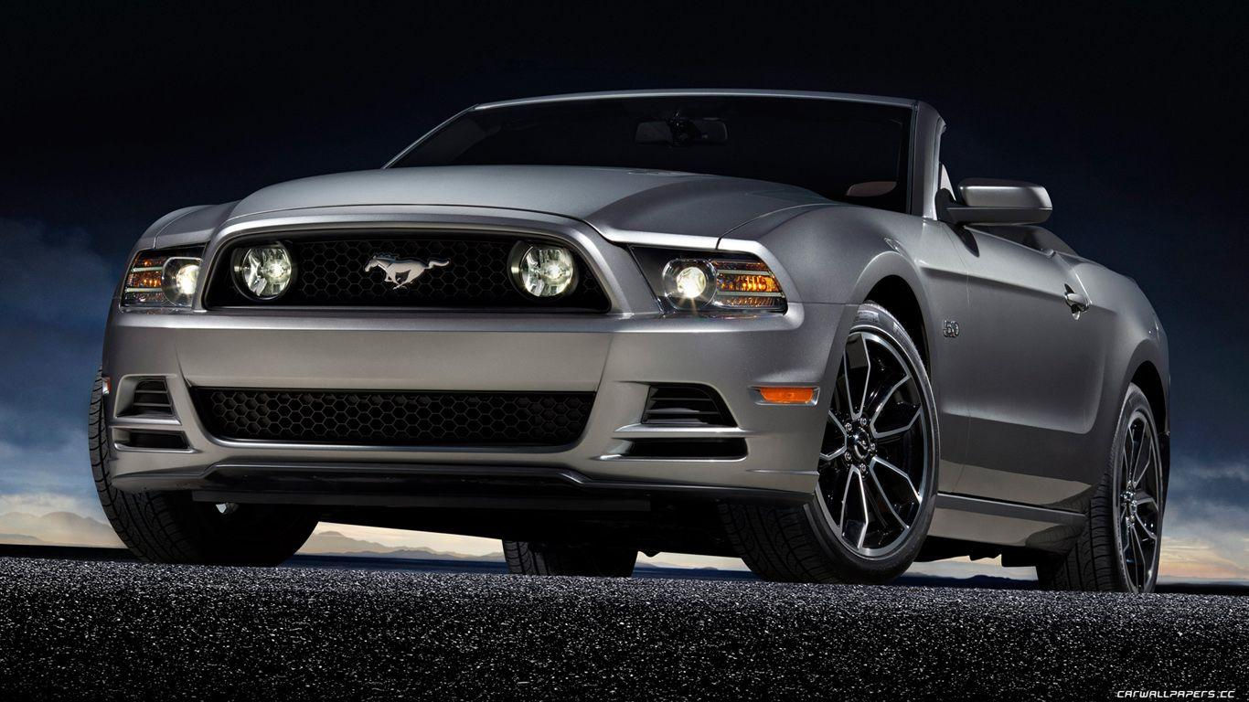Wallpaper #nUUgl44B7YBJg1BVN6AP37 A Sleek Silver Ford Mustang GT Convertible with the Top Down