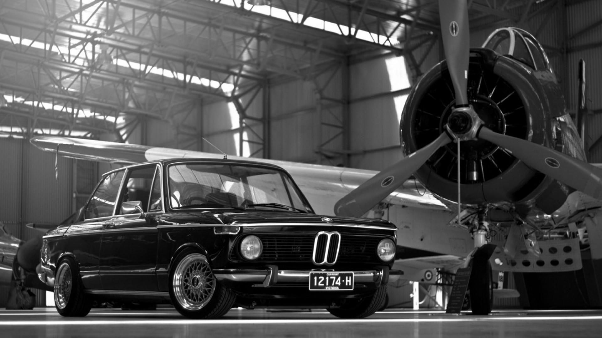 Wallpaper #_3MOho4BFI5NbQksfx5p16 A Black and White Photo of a Classic BMW 2002tii