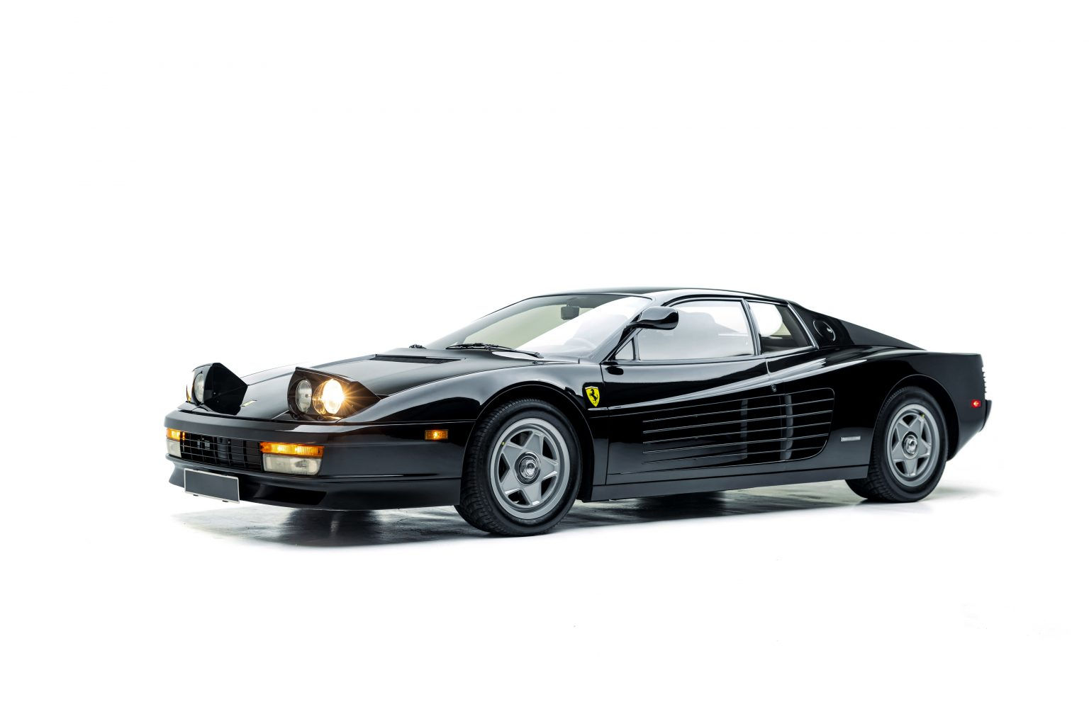 Wallpaper #qGi7G5MBSpphPi3-JiC2312 Any Colour as Long as Its Black Five Testarossas at Rm Auction Magneto