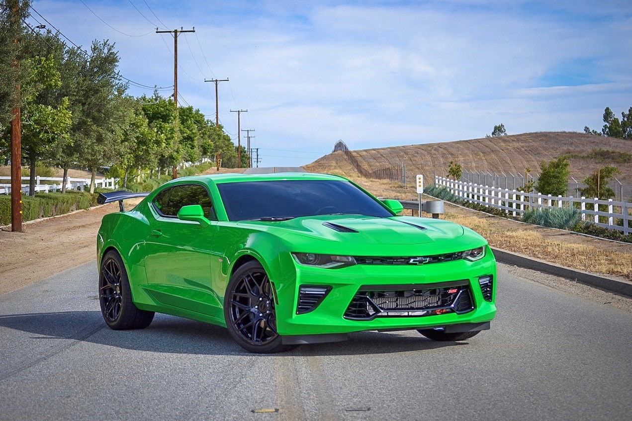 Wallpaper #accc0 Neon Lit Camaro Parked by the Ocean on Craiyon