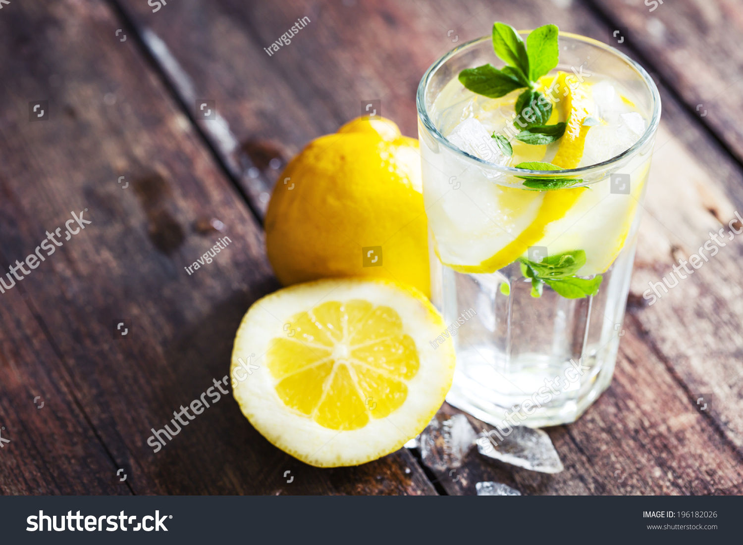 Wallpaper #GGfpAZMBSpphPi3-Wa1b67 Lemonade with Fresh Lemon on Wooden Background Stock Photo 196182026