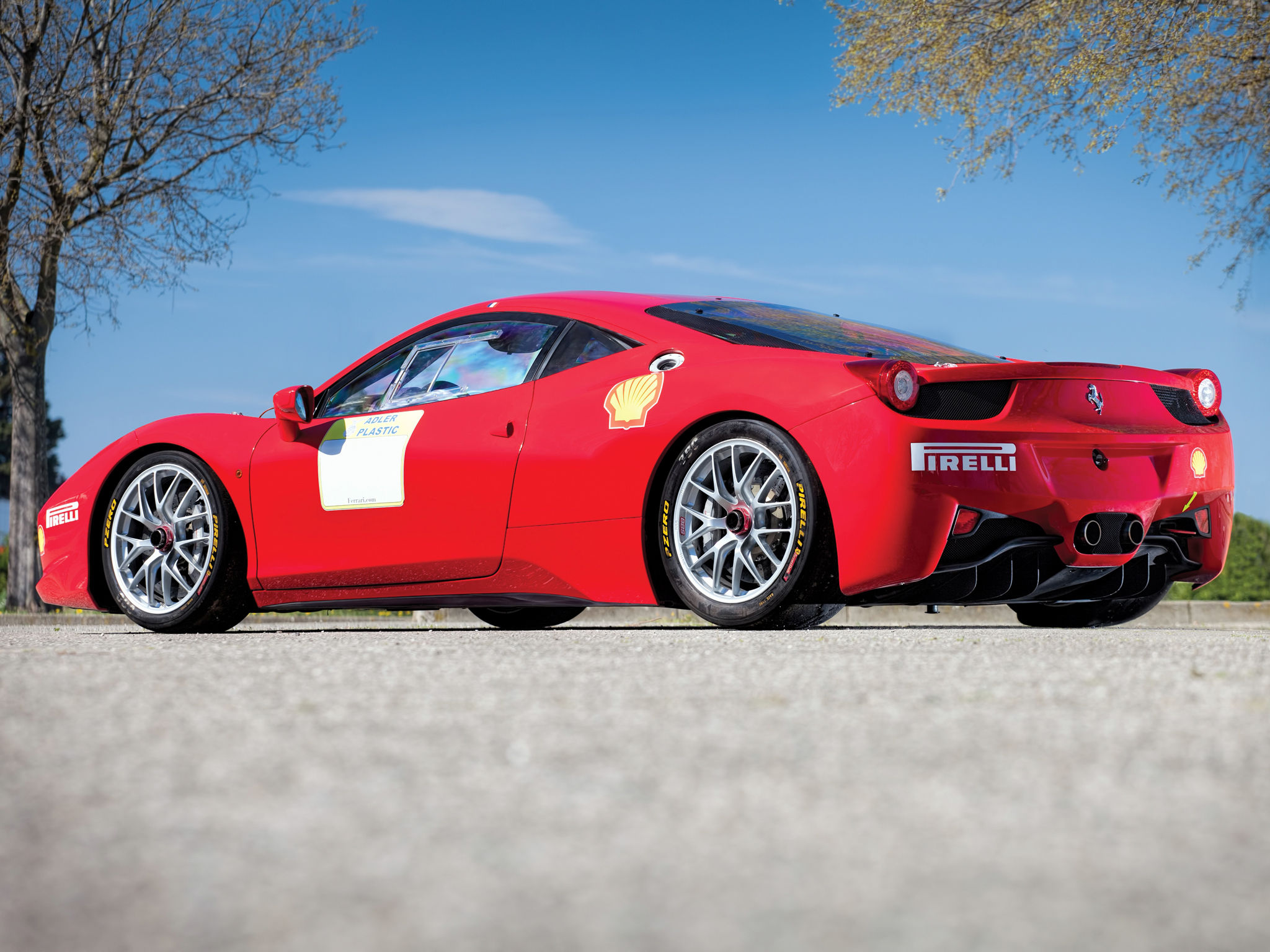 Wallpaper #53NJh44BFI5NbQkspCDD1 A Sleek Red Ferrari 458 Challenge Race Car on the Track