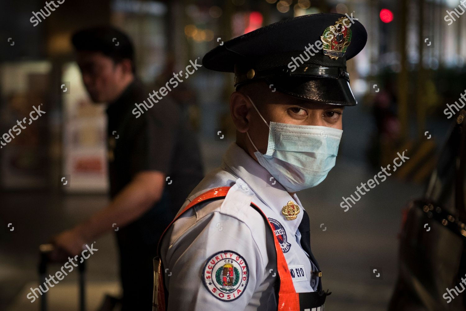 Wallpaper #xuqKVZMBlwTYPL18yg2e377 Security Guard Wears Face Mask Precaution Editorial Stock Photo Stock