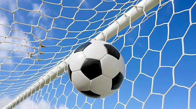 Wallpaper #v7hw2pIBJvJKYCmEjfFq434 Soccer Ball Scores in the Net Victory Moment in a Football Game Goal