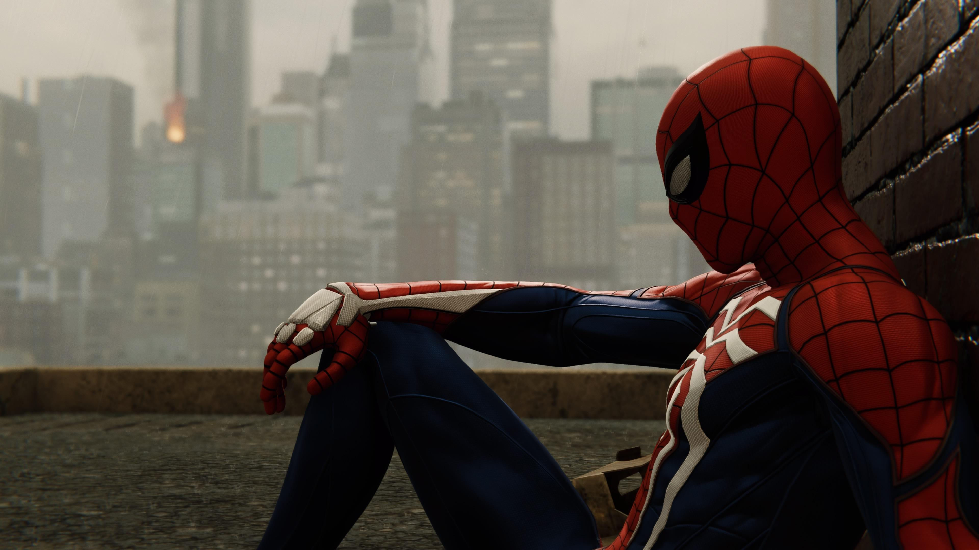 Wallpaper #GkWwlY4B7YBJg1BVIaCK34 Spider-Man Looking Out Over a Rainy City