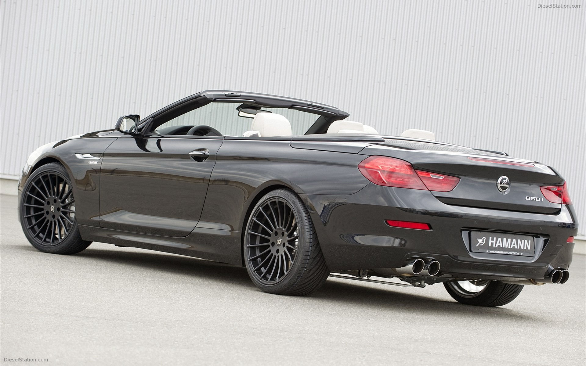 Wallpaper #VkVolo4B7YBJg1BVLqAC58 A Black BMW 6 Series Convertible with the Top Down