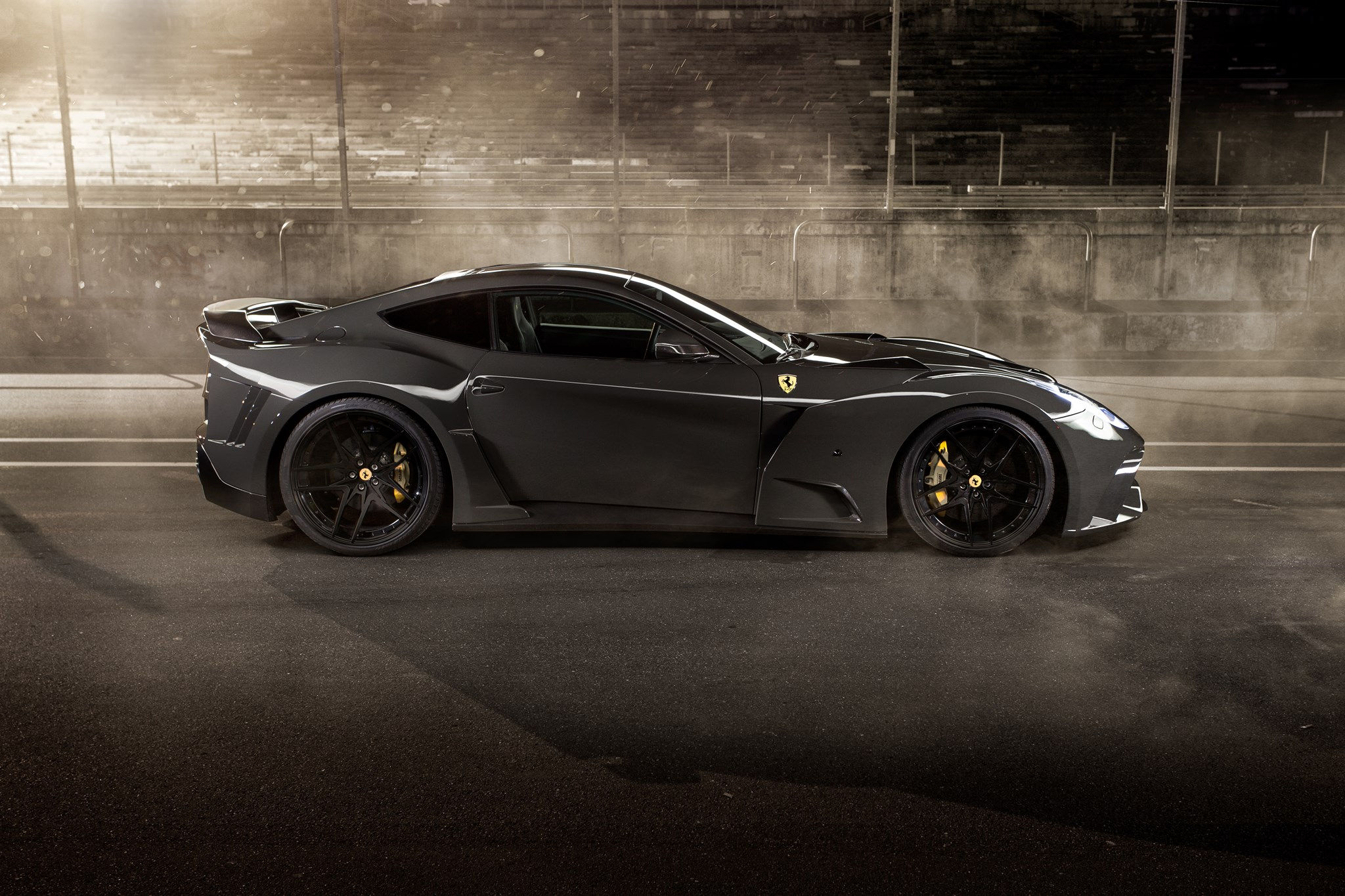 Wallpaper #3UUMm44B7YBJg1BVsKG021 A Sleek Black Ferrari 599xx Parked on an Urban Street