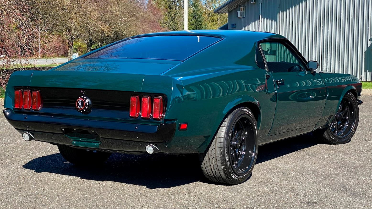 Wallpaper #GUUPmI4B7YBJg1BV-qHR28 A Restored Classic 1969 Ford Mustang Mach 1 in Dark Green