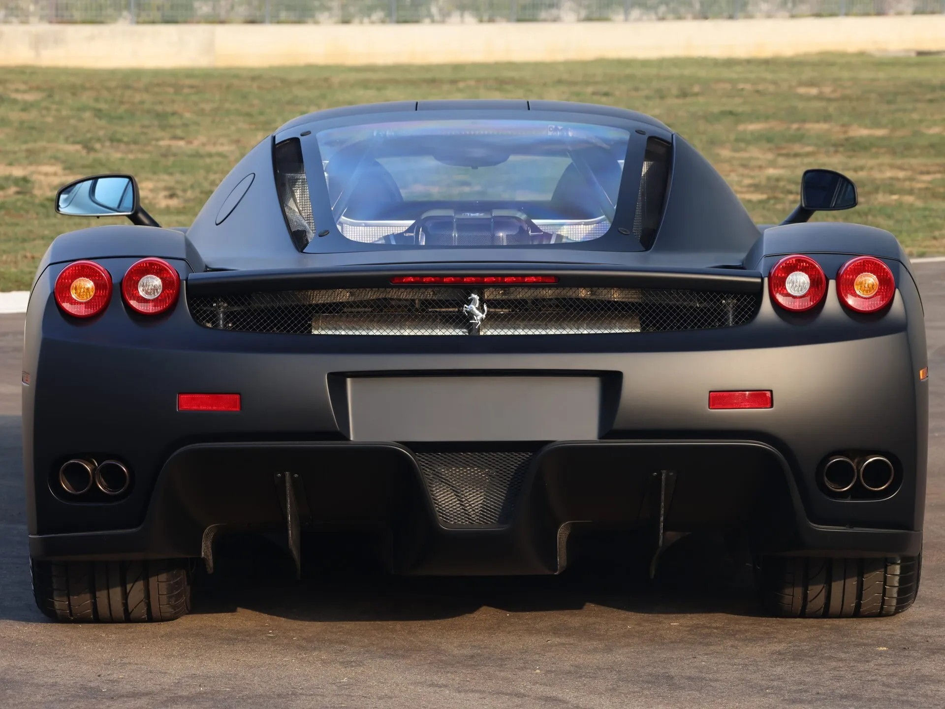 Wallpaper #fHQ3044B_8f4nGFaT3VF12 1 of 1 Matte Black Ferrari Enzo Brings Us Back to the Simpler Times of