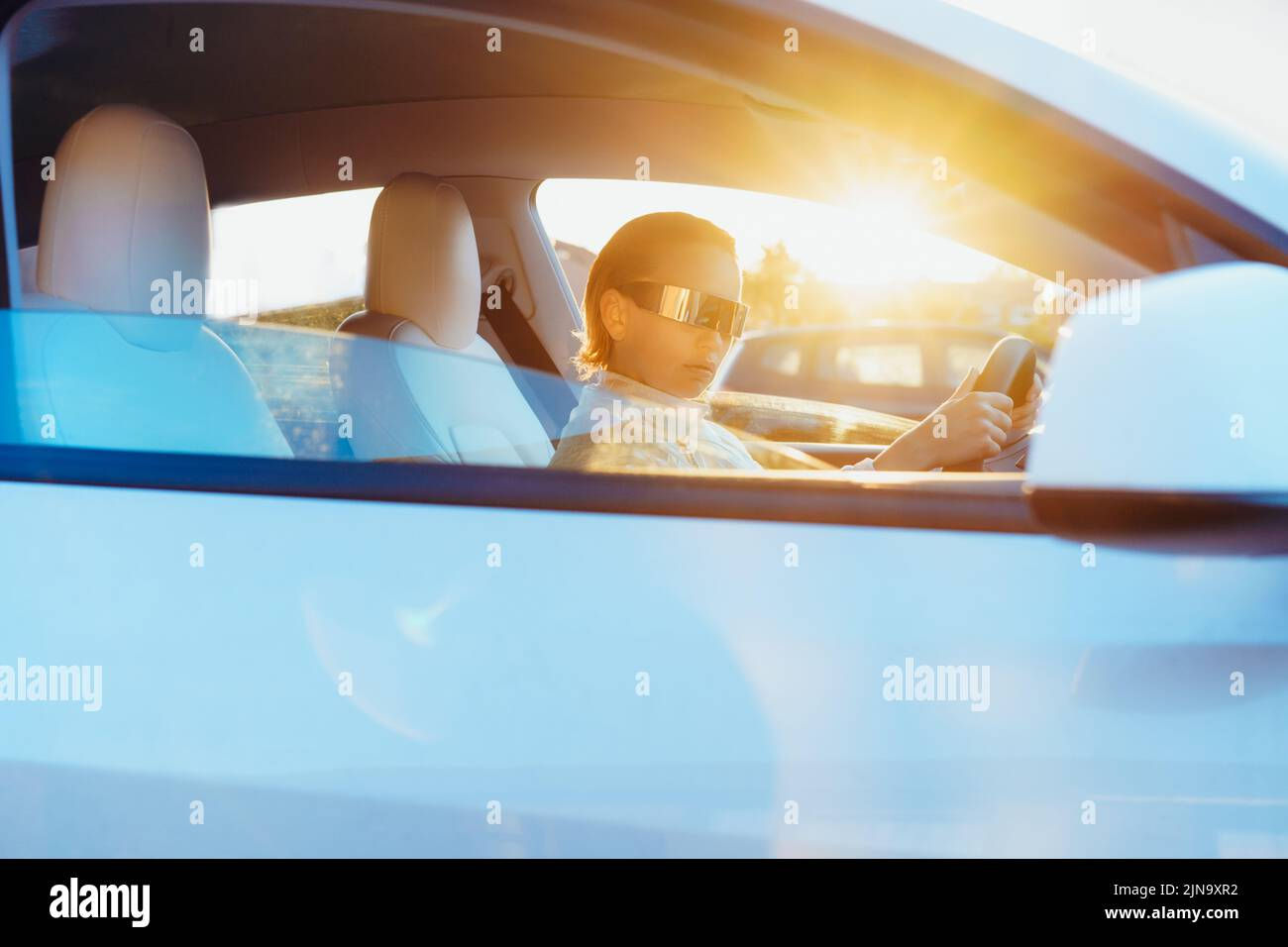 Wallpaper #ITtMbZcBSWmA-tzpYo4d49 Portrait of Fashion Cyberpunk Girl Driving a White Supercar in Sunsert