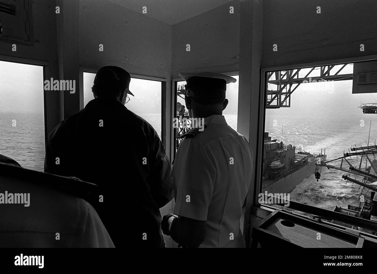Wallpaper #5WfOApMBSpphPi3-ELDY441 Vice President George Bush and Capt Tony Less Watch from the Bridge of