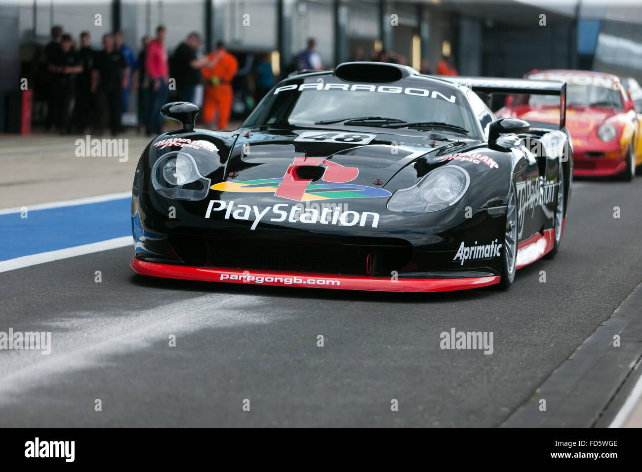 Wallpaper #U82mSJMBxE4VIvfv37UG70 A Porsche 911 Gt1 Evo in the Pit Lane During a Demonstration Session