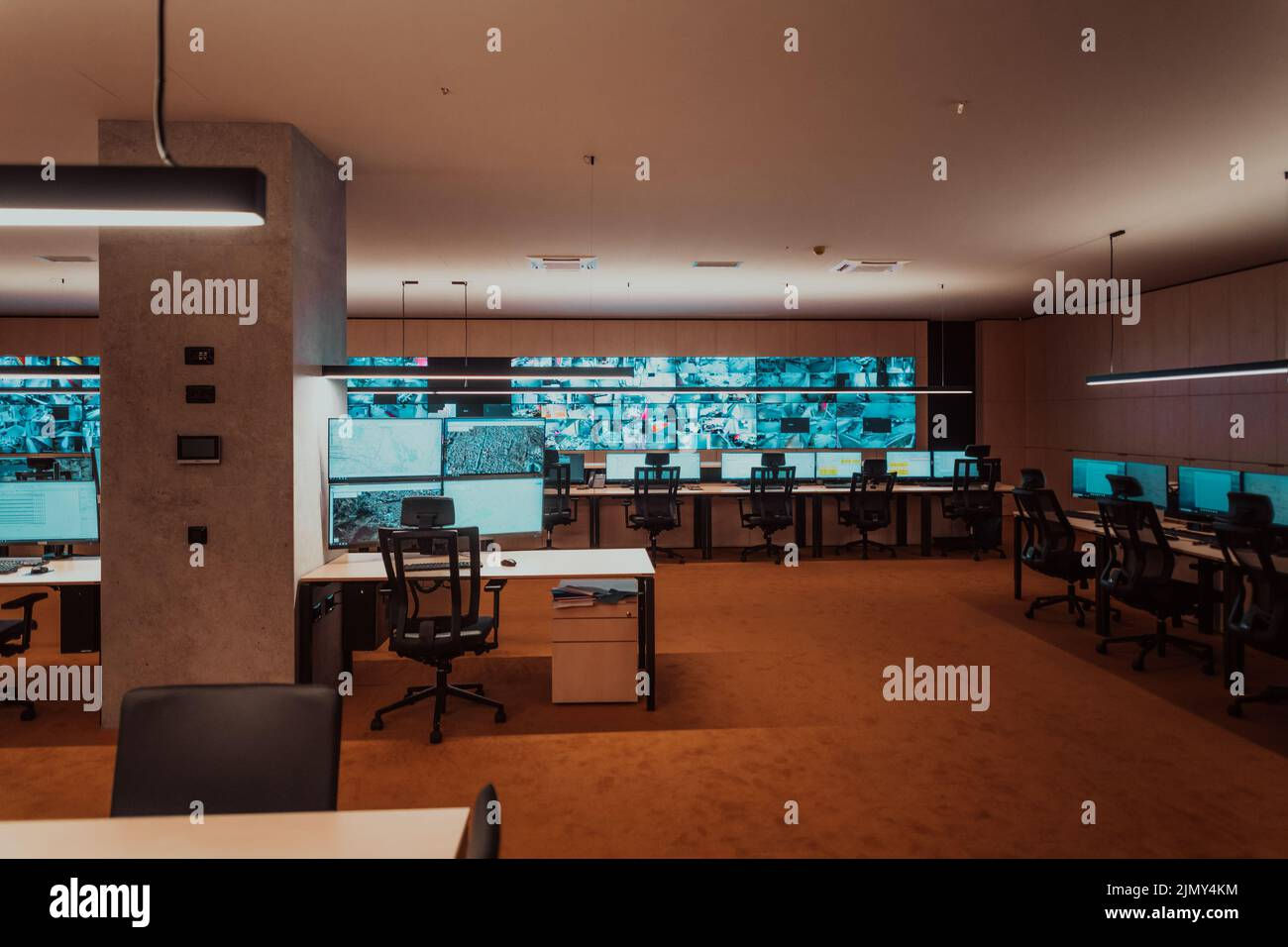 Wallpaper #MWcjC5MBSpphPi3-X9jd247 Empty Interior of Big Modern Security System Control Room Workstation