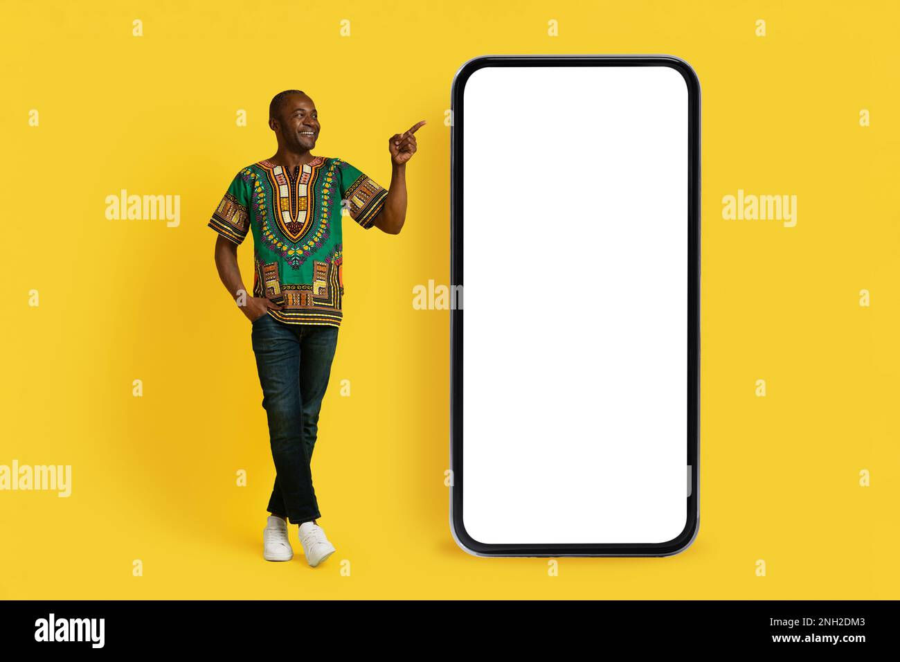 Wallpaper #IWf6_JIBSpphPi3-lZoB243 Cheerful Black Man Pointing at Big Smartphone Mockup Stock Photo Alamy