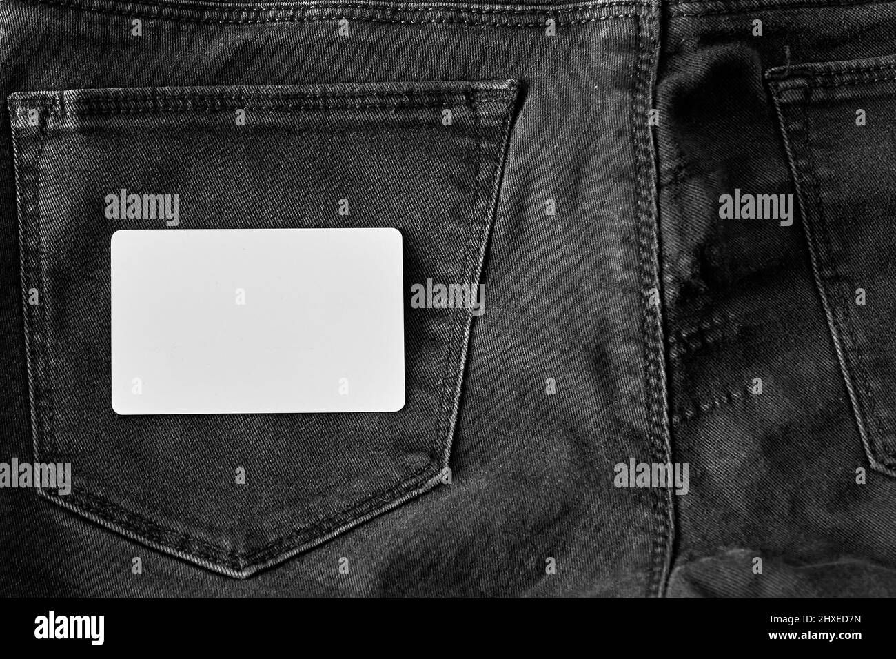 Wallpaper #ngM0ZpMBpyOg8YnEJtr-282 The Upper Part of Old Worn Black Jeans with Pockets and a White Tag for