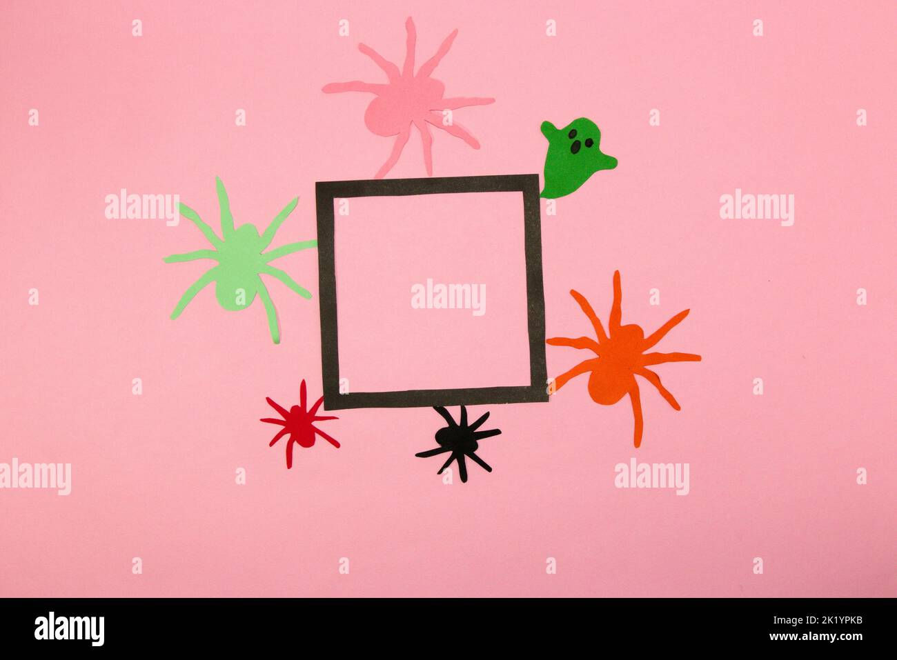 Wallpaper #g_RLOZMBKFX8bn3rLHYG166 Colorful Ghost Spiders Around a Black Frame on a Pink Background