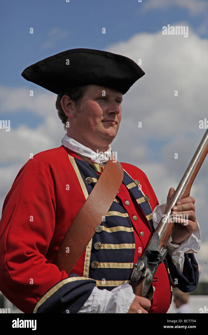 Wallpaper #Cbj11pIBJvJKYCmEf-Ex48 A Role Player Dressed in British Red Coat Uniform of the 17th Century