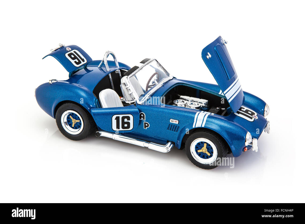 Wallpaper #mWeB-5IBSpphPi3-c5Sm59 Ac Cobra Coupe in Racing Trim on a White Background Fitted with a Ford