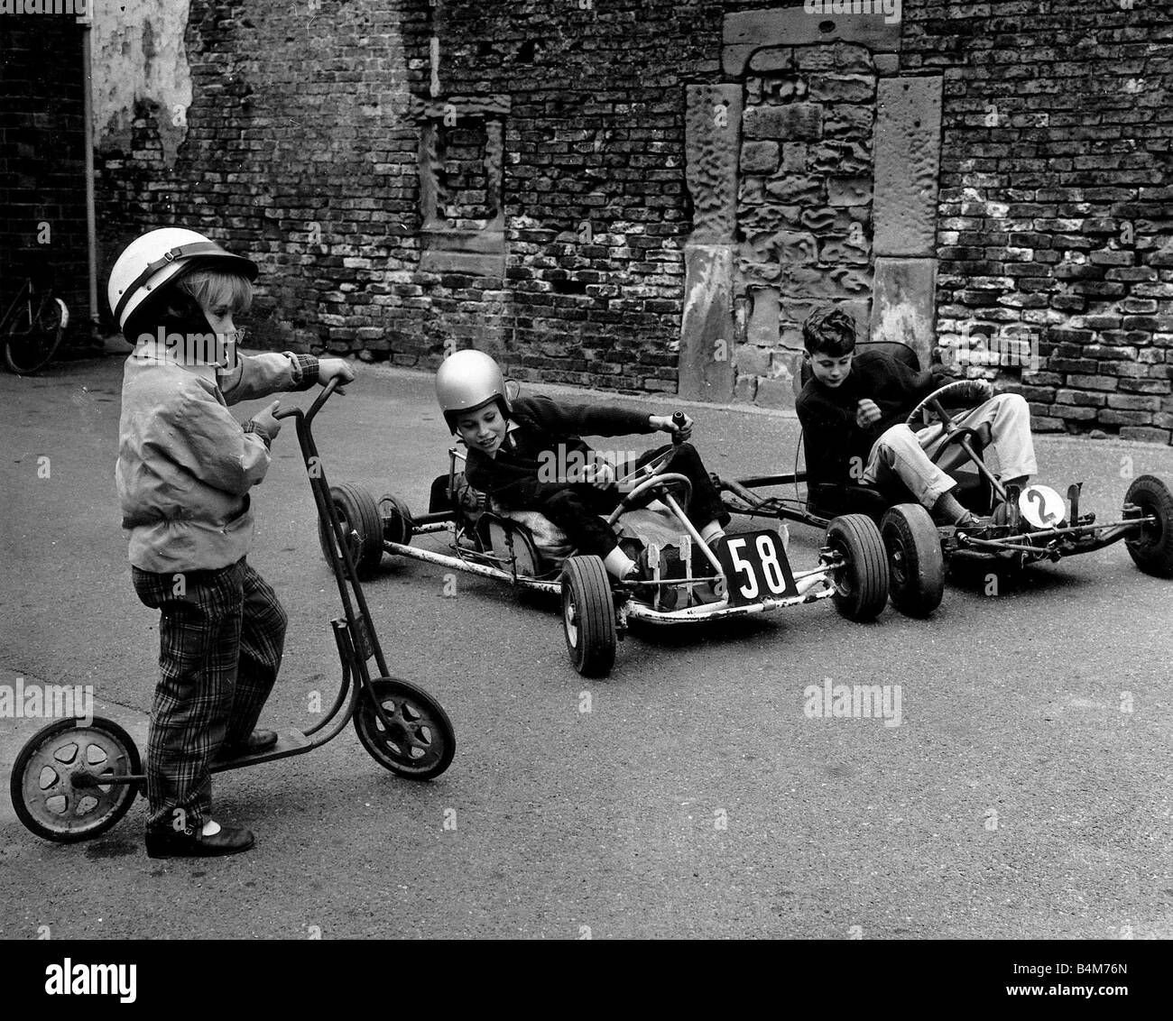 Wallpaper #OWf7C5MBSpphPi3-39xJ326 Children Play on Their Scooter and Go Karts Circa 1960 Stock Photo Alamy