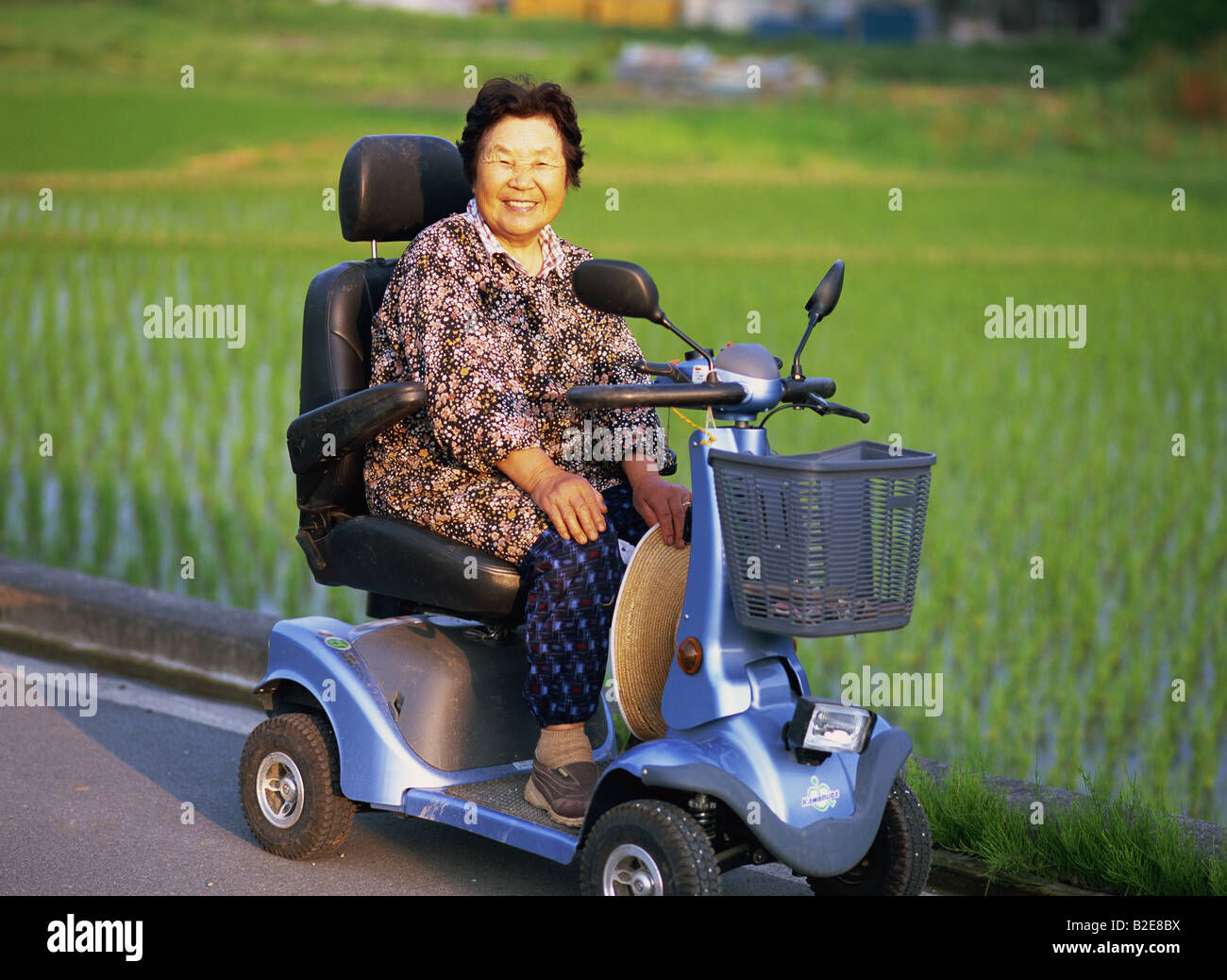 Wallpaper #wuqLUpMBlwTYPL18Cgn-269 An Elderly Japanese Woman on a Mobility Scooter Stock Photo Alamy