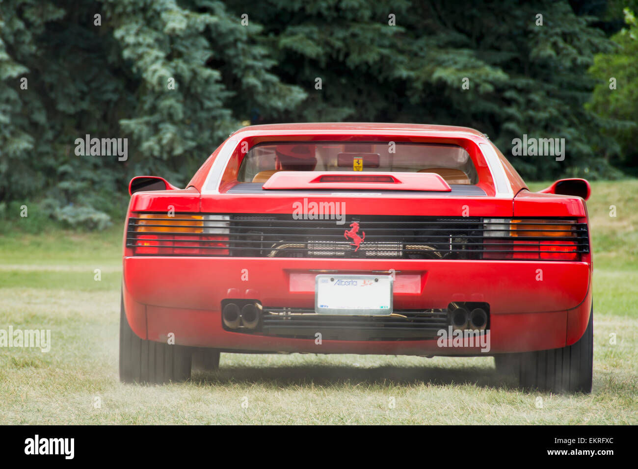 Wallpaper #hn2z844Bnwiau_P6PQ1r31 Red Ferrari Testarossa Seen from the Rear with Exhaust Fumes Calgary