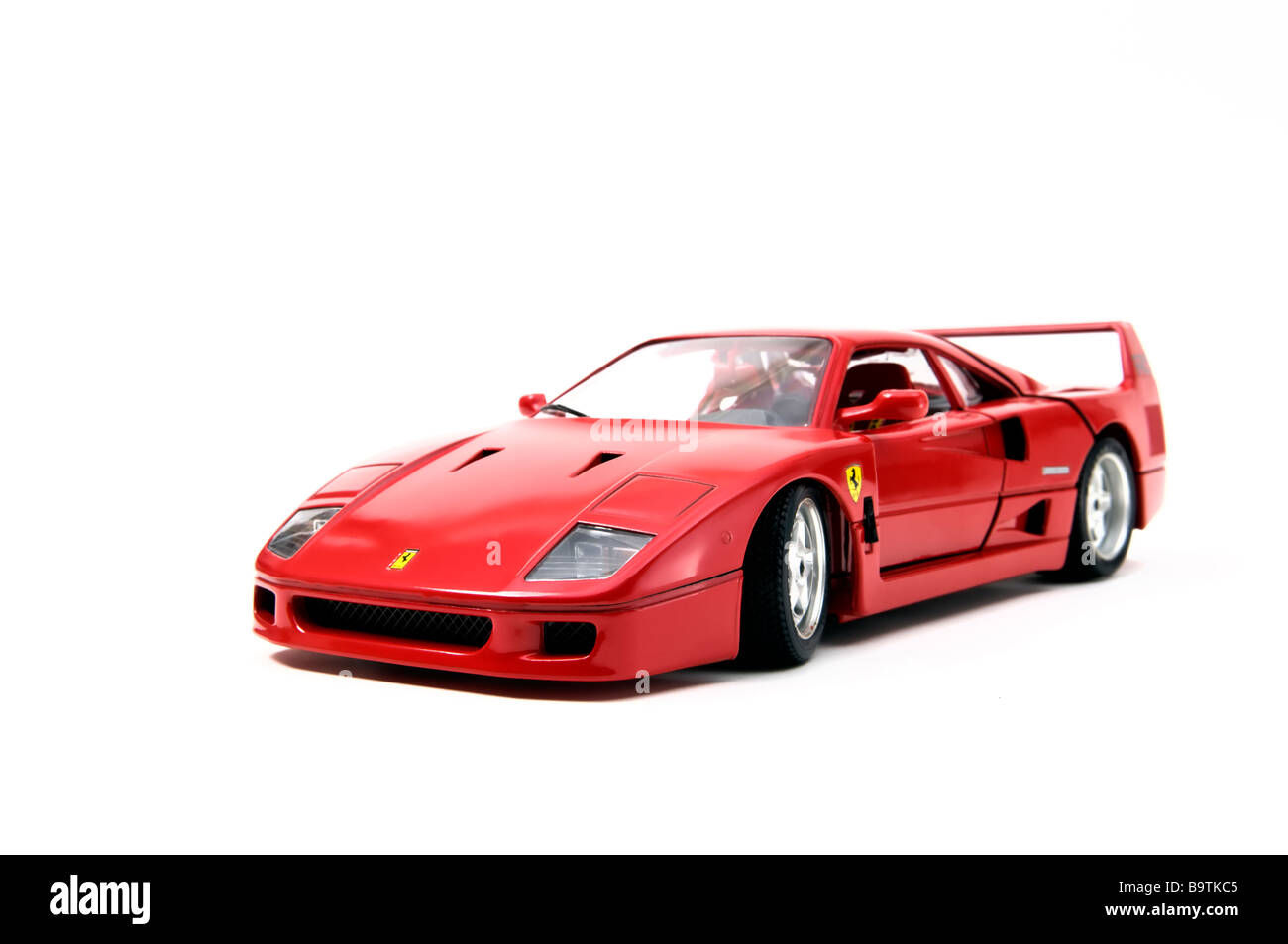 Wallpaper #eM5AJZMB71dOy6JZyBMM272 Miniature Replica of a Red Ferrari F40 Model Car Made by Model Car