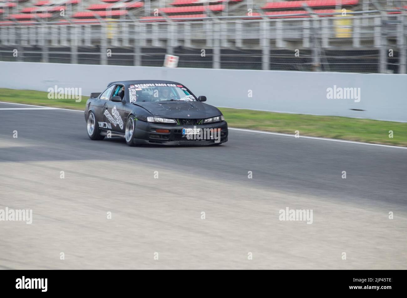 Wallpaper #CGjlFpMBSpphPi3-Tg0a139 A Shallow Focus of a Drifting Black Custom Tuning Car Stock Photo Alamy