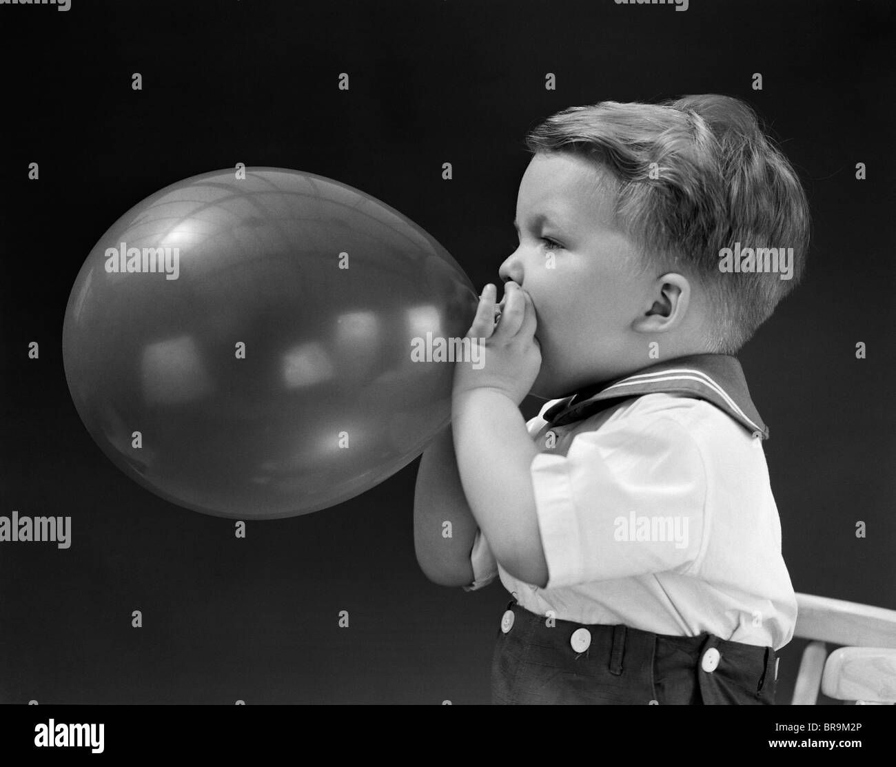 Wallpaper #JBVKNpMB-CQNECa2ESf_132 Boy Blowing Up Balloon Hi Res Stock Photography and Images Alamy