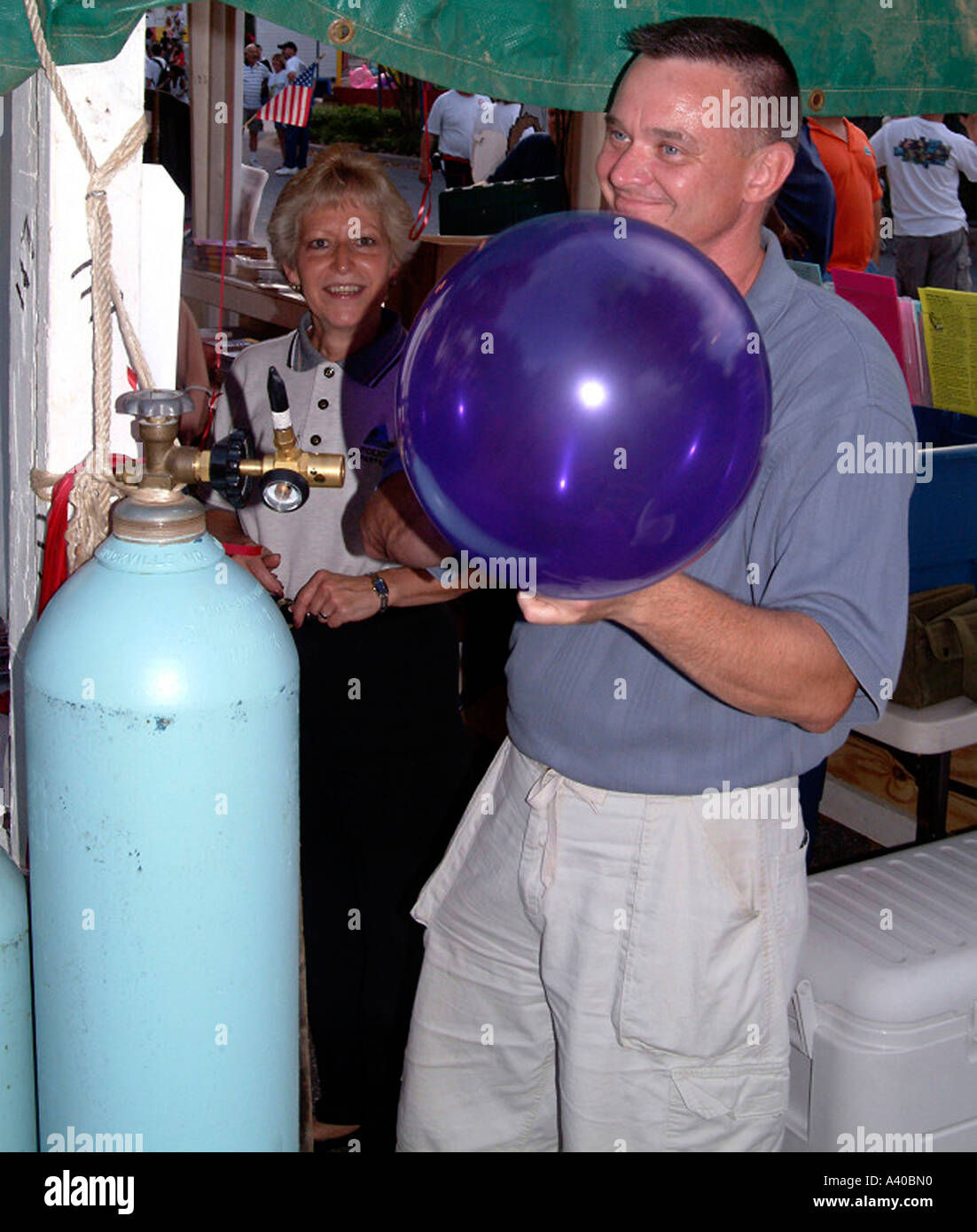 Wallpaper #JBVKNpMB-CQNECa2ESf_243 Man Blowing Up Balloon from Helium Tank Stock Photo Alamy