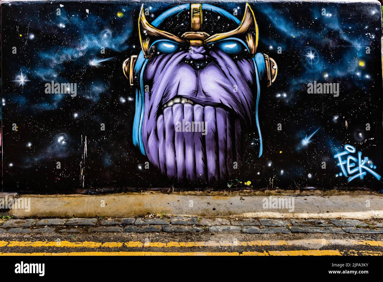 Wallpaper #Q6UoOJMBVBiSkHCaFY0Z97 The Thanos Comic Book Character Graffiti in Trafalgar Lane Stock Photo