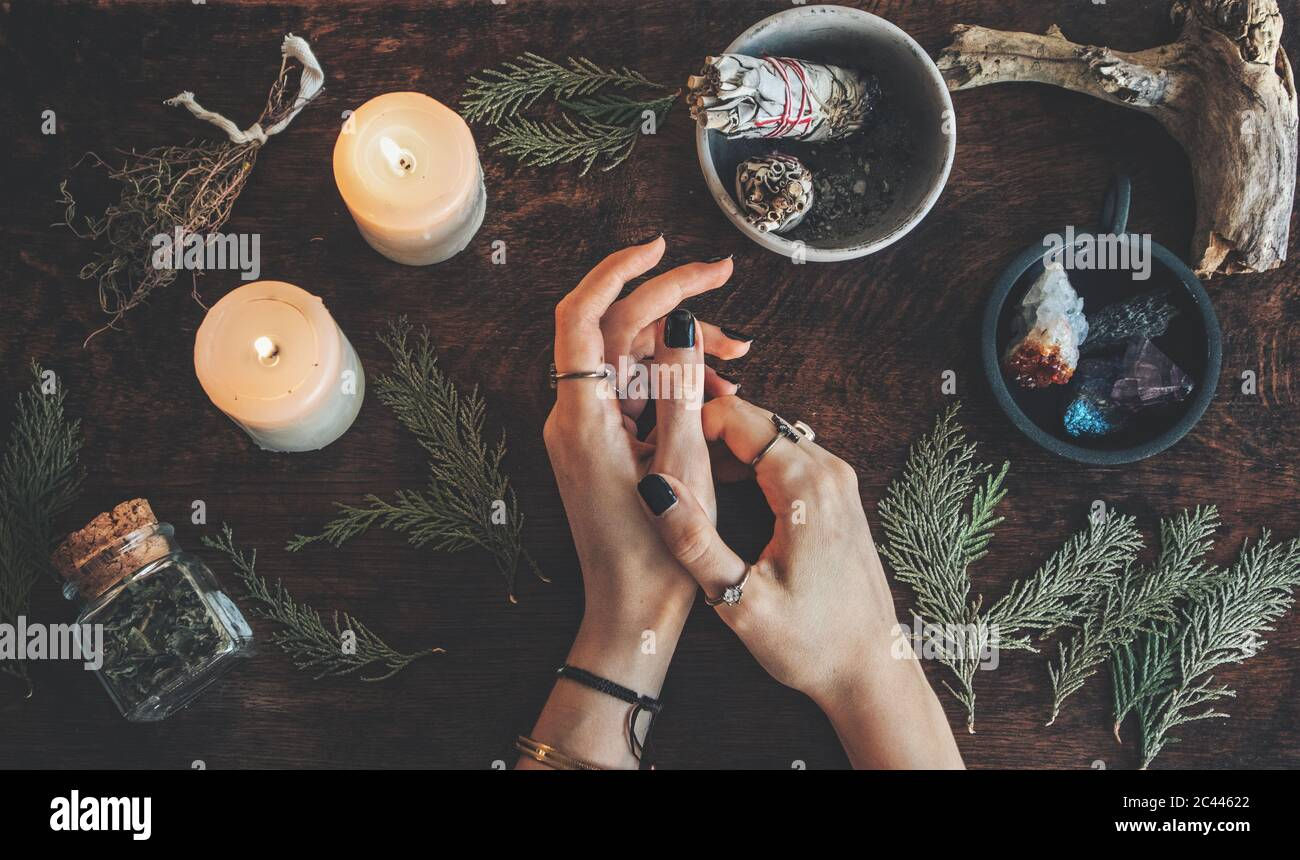 Wallpaper #7GfOA5MBSpphPi3-UbSW106 Witches Hands on Table Ready for Spell Work Wiccan Witch Altar Filled