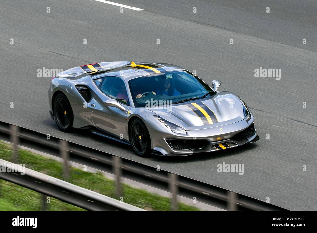 Wallpaper #iHMKhI4BFI5NbQksKxzx11 Matte Grey Ferrari 488 Pista with Yellow Stripes Hi Res Stock