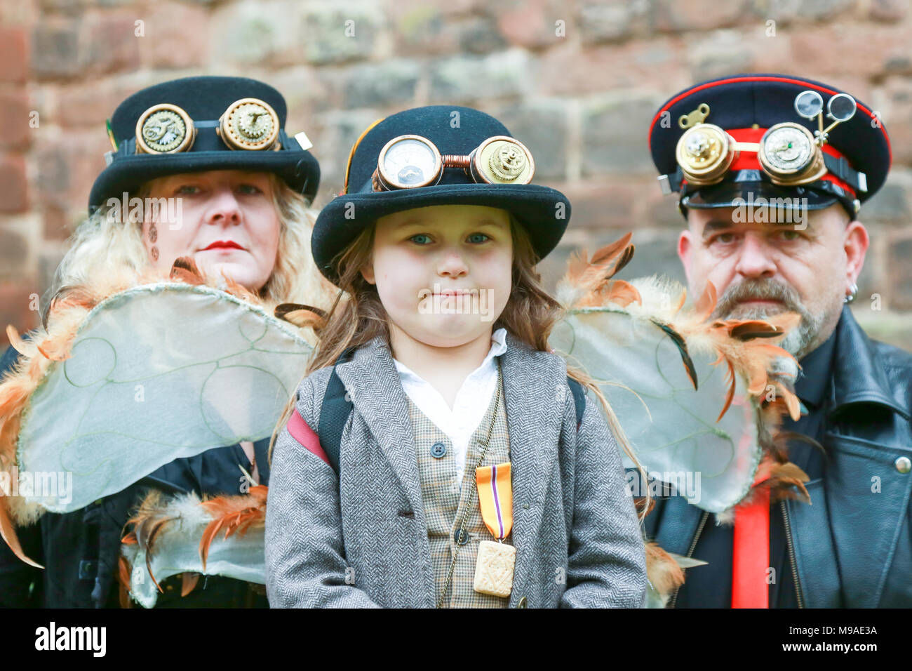 Wallpaper #5mh2HJMBSpphPi3-syIJ160 Young Girl Aged Six 6 with Her Grandparents Wearing Steampunk Clothing