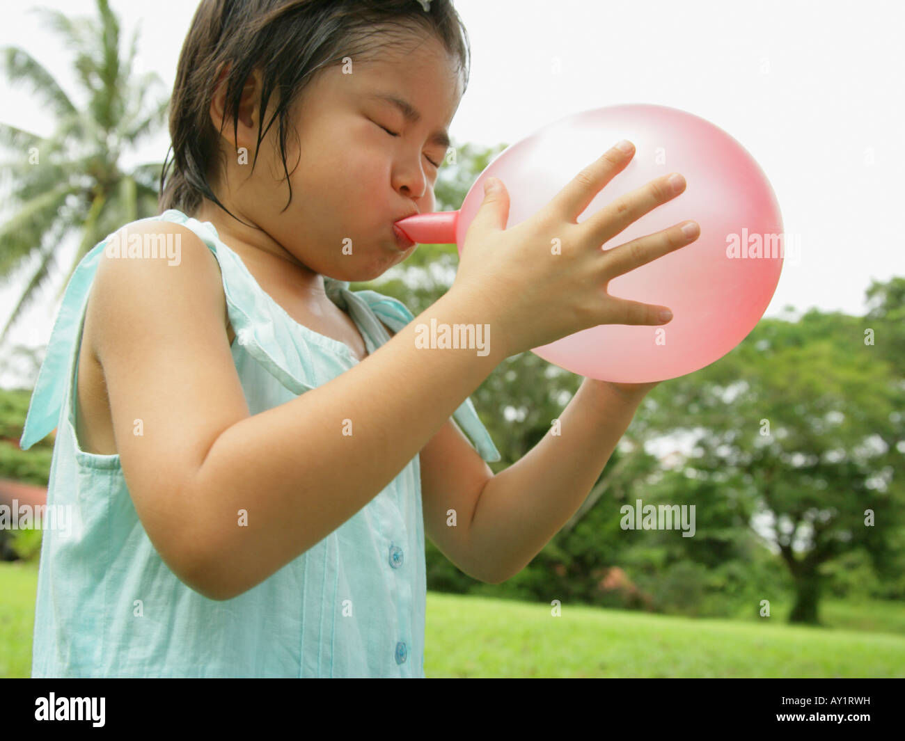 Wallpaper #JBVKNpMB-CQNECa2ESf_153 Close Up of a Girl Blowing a Balloon Stock Photo Alamy