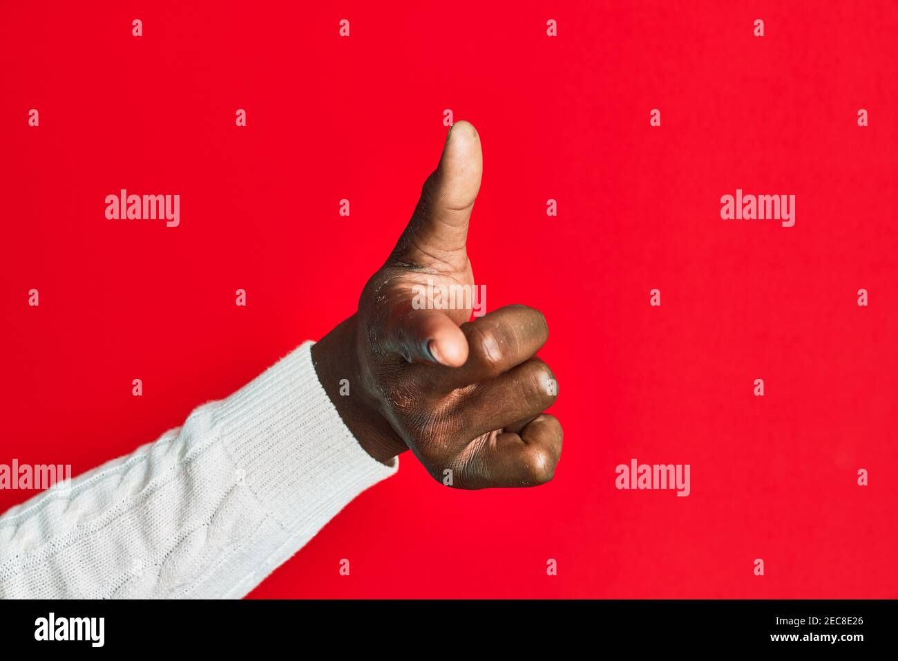 Wallpaper #IWf6_JIBSpphPi3-lZoB384 Arm and Hand of African American Black Young Man Over Red Isolated