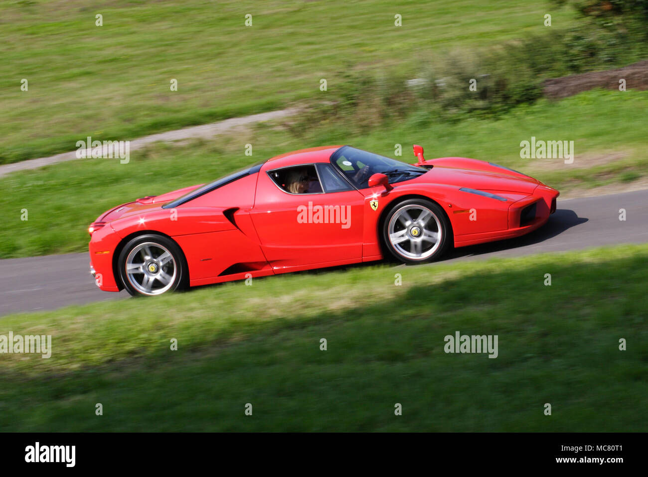 Wallpaper #eM5AJZMB71dOy6JZyBMM111 Profile Side View of a Sexy Red Ferrari Enzo Mid Engined V12 Hyper
