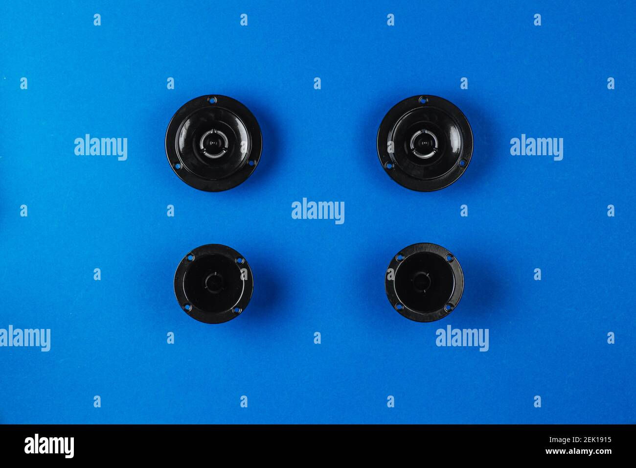 Wallpaper #0GjUI5MBSpphPi3-fza6360 Car Audio Car Speakers on a Blue Background Copy Space Stock Photo