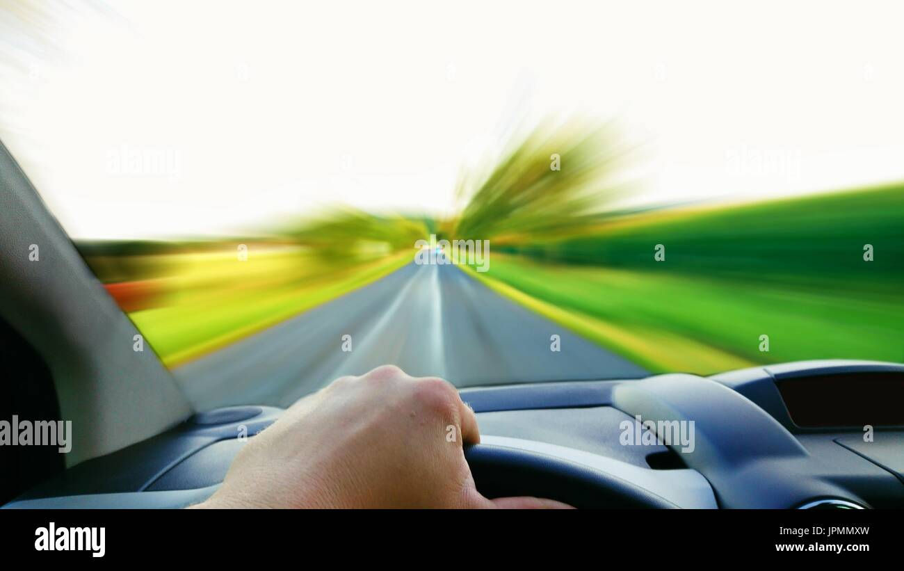Wallpaper #EhkLM48BtGB6xQ78r5nJ31 First Person View of the Driver Behind the Wheel Driving a Fast Car