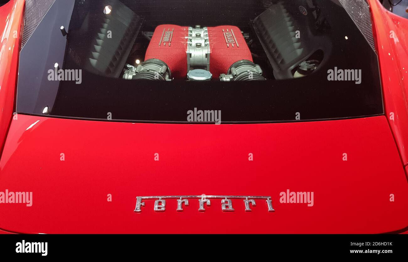 Wallpaper #tBo_T5MB1yWOL4qgn346151 A Red Ferrari Engine is Parked in Tnps Car Rama 9 Road a Close Up of