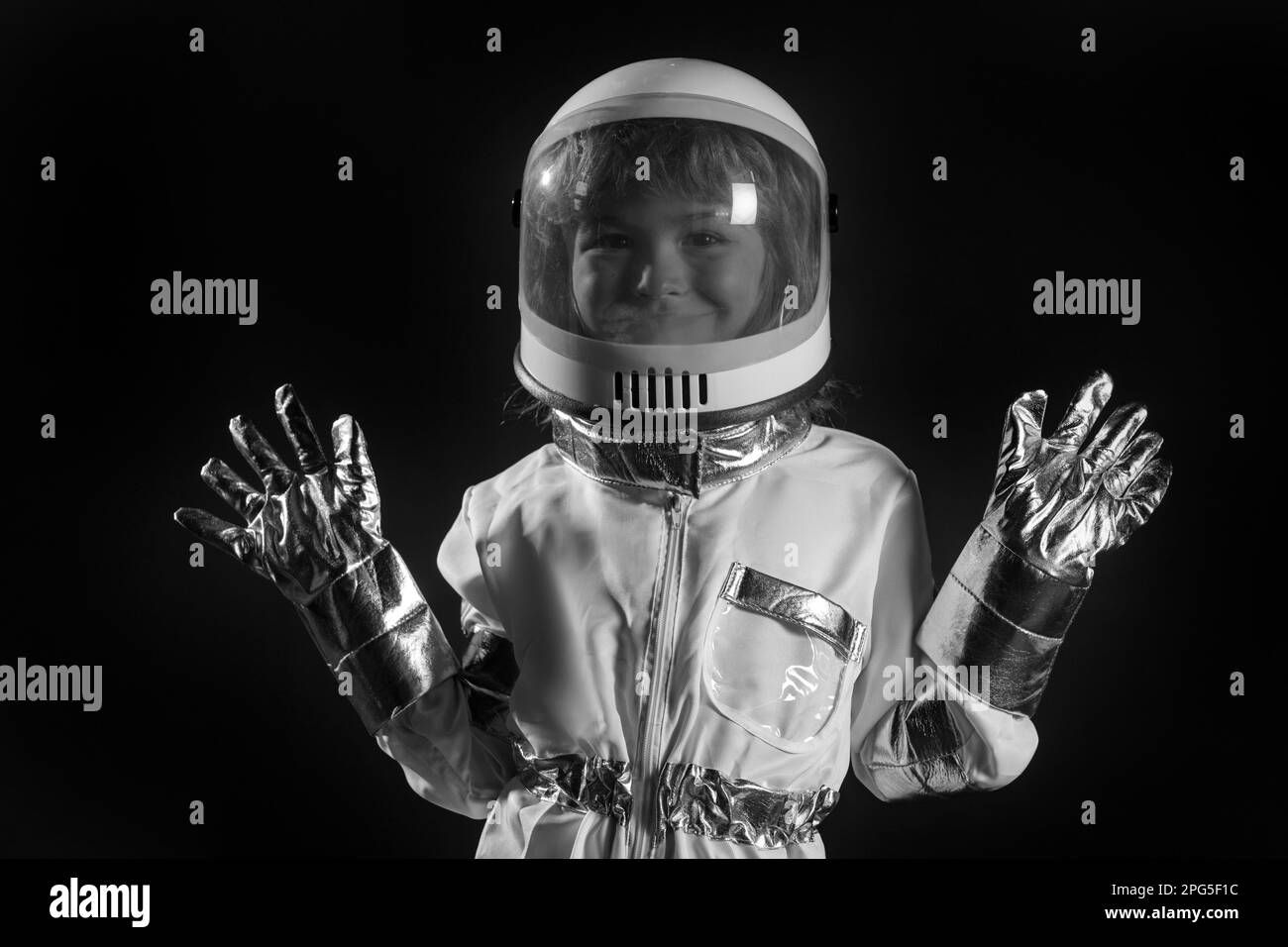 Wallpaper #2BGgM5MBXrlMTfB5u0qk196 Portrait of Wondered Little Astronaut in Helmet and Protective Space