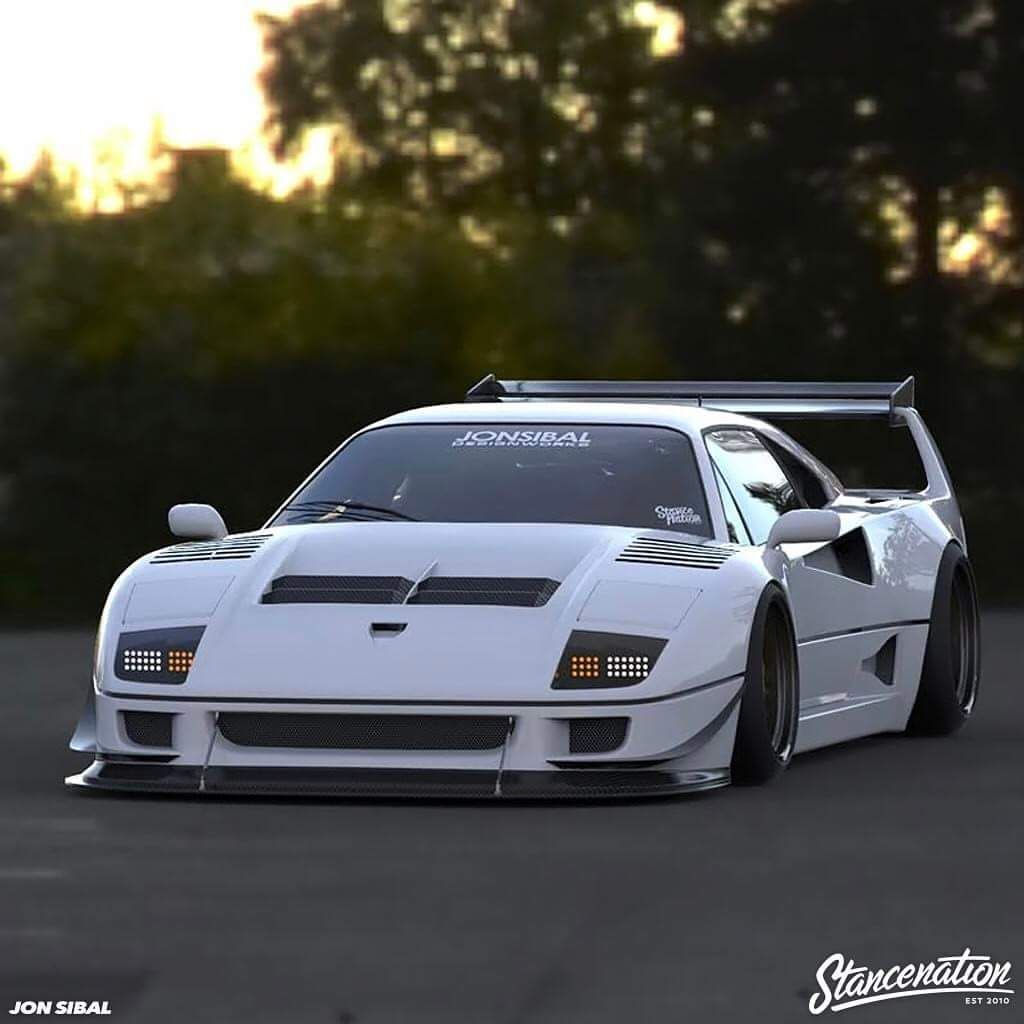Wallpaper #K3OBh44BFI5NbQksaSEI34 A White Ferrari F40 with a Wide Body Kit and a Large Rear Wing