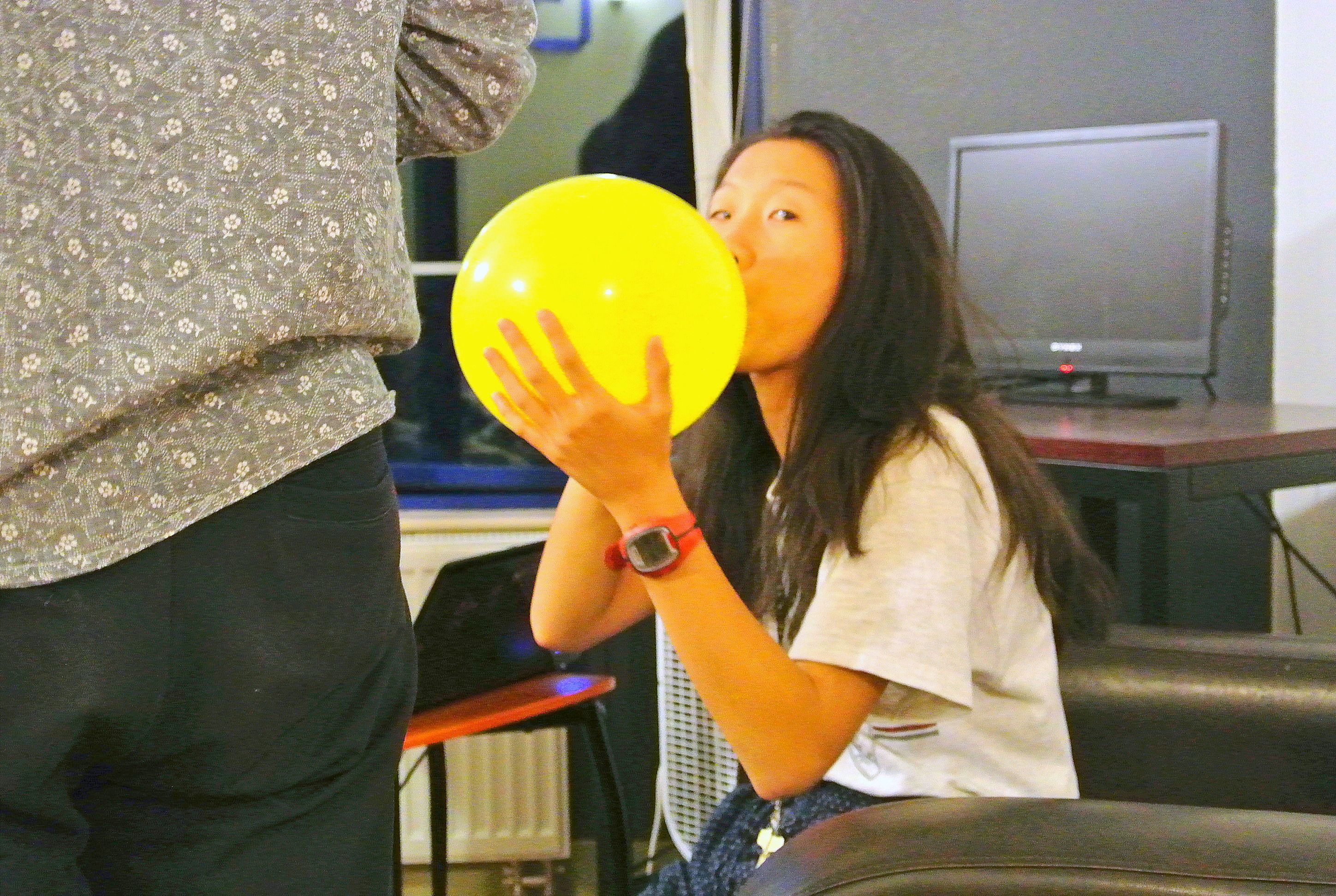 Wallpaper #JBVKNpMB-CQNECa2ESf_129 One of Our Students Blowing Up a Balloon with Her Friends Business