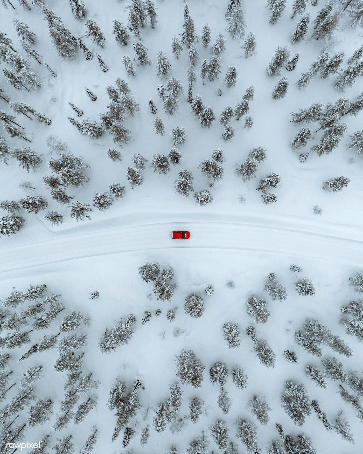 Wallpaper #phoQUpMB1yWOL4qgsYK1175 Drone View of a Red Car Driving Though a Snowy Forest in Lapland