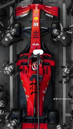 Wallpaper #W7j325IBJvJKYCmEfflv489 Top View of Red Race Car