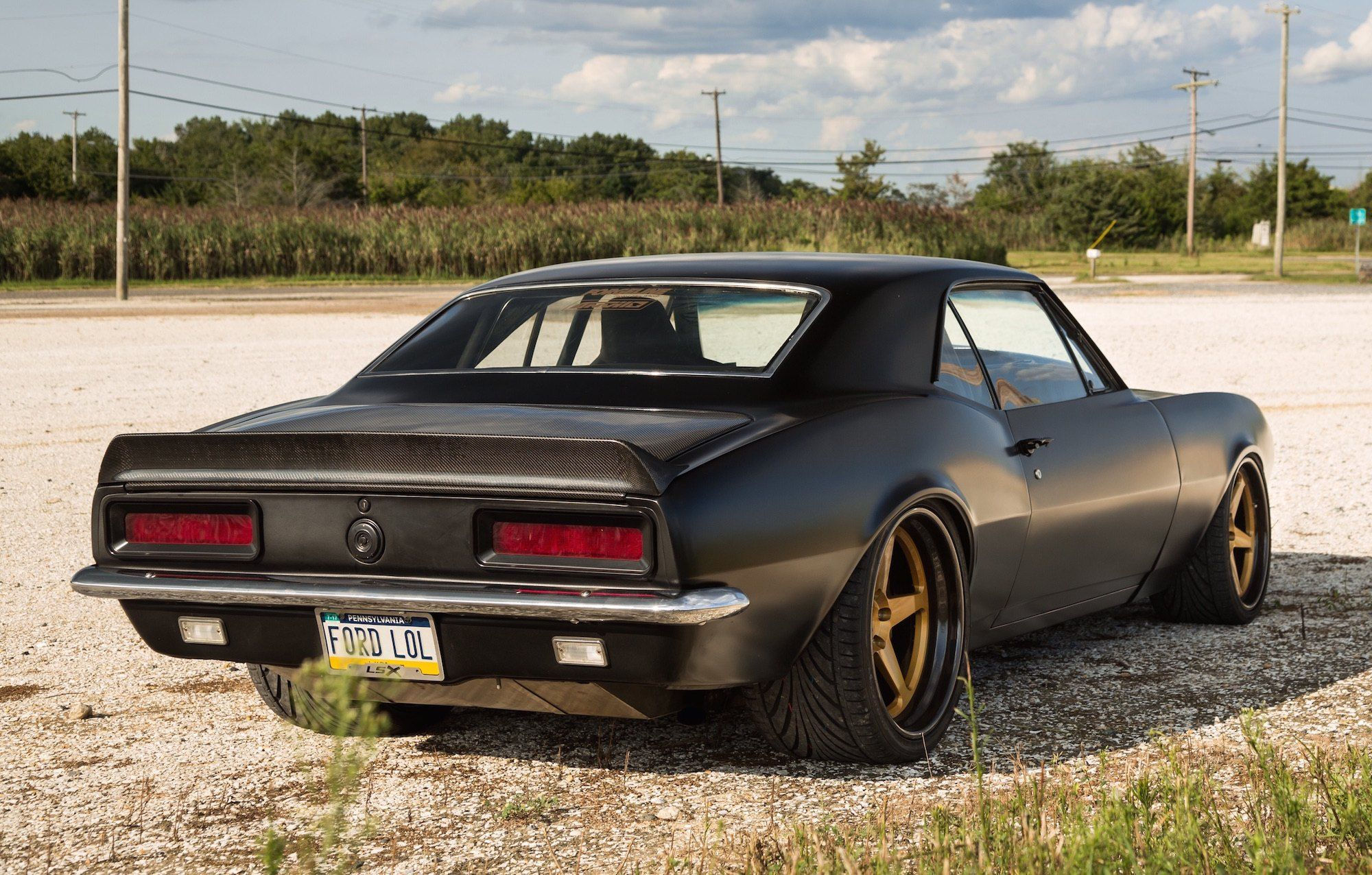 Wallpaper #aUCWMZMBJhL2WPbavcev27 Mysterious Black Matte Chevy Camaro with Carbon Fiber Hood Camaro