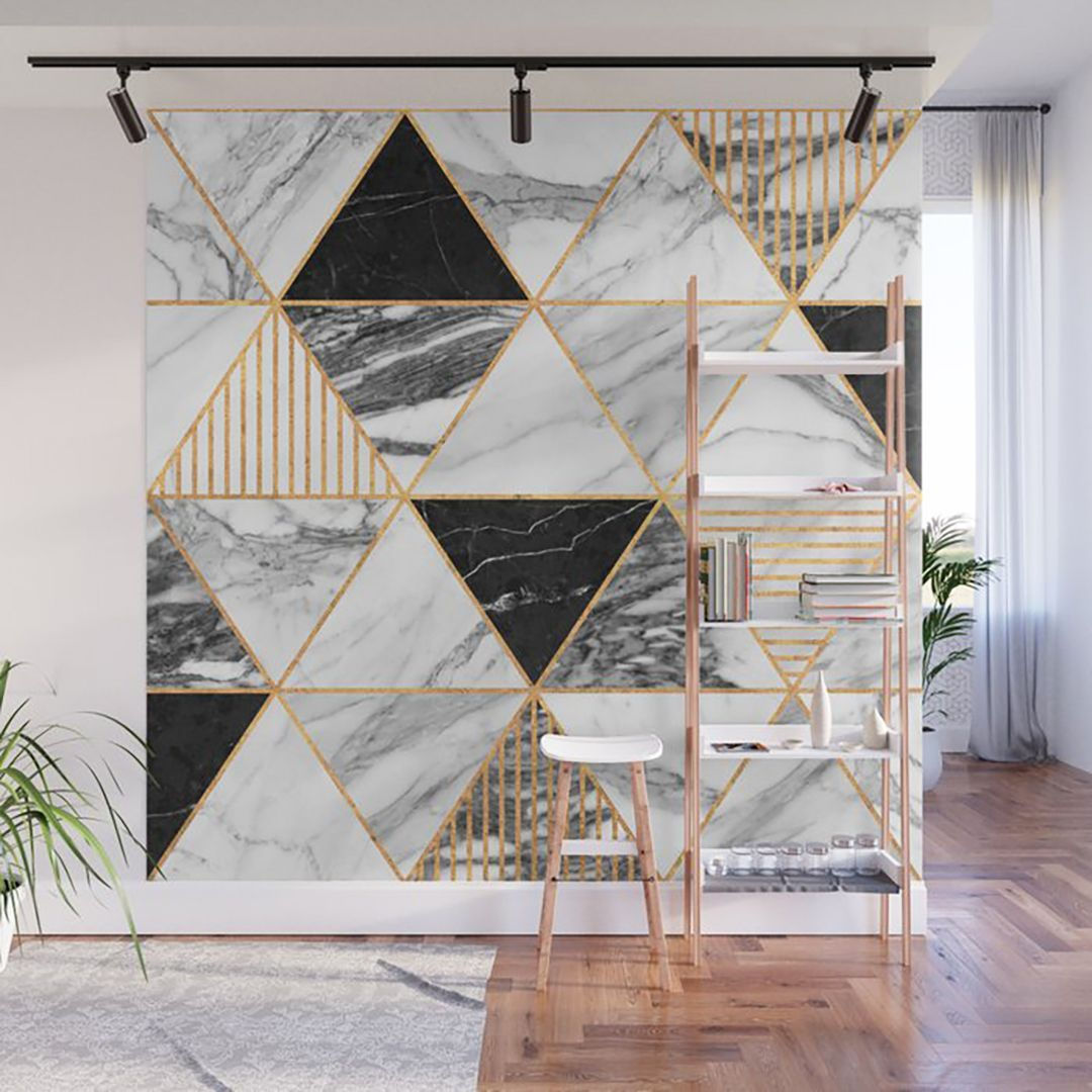 Wallpaper #a2flDJMBSpphPi3-ROG8336 A White Marble Wall with Gold Accents and Geometric Shapes on It Along