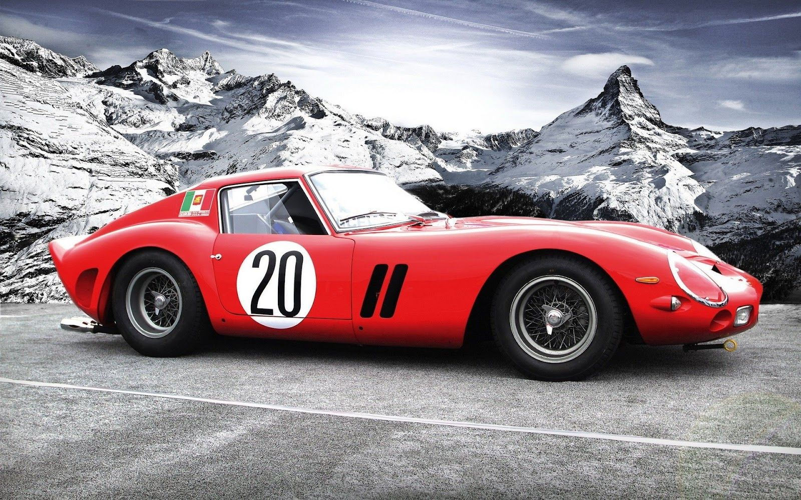 Wallpaper #_3MOho4BFI5NbQksfx5p31 A Classic Red Ferrari 250 Gto on a Snowy Mountain Road